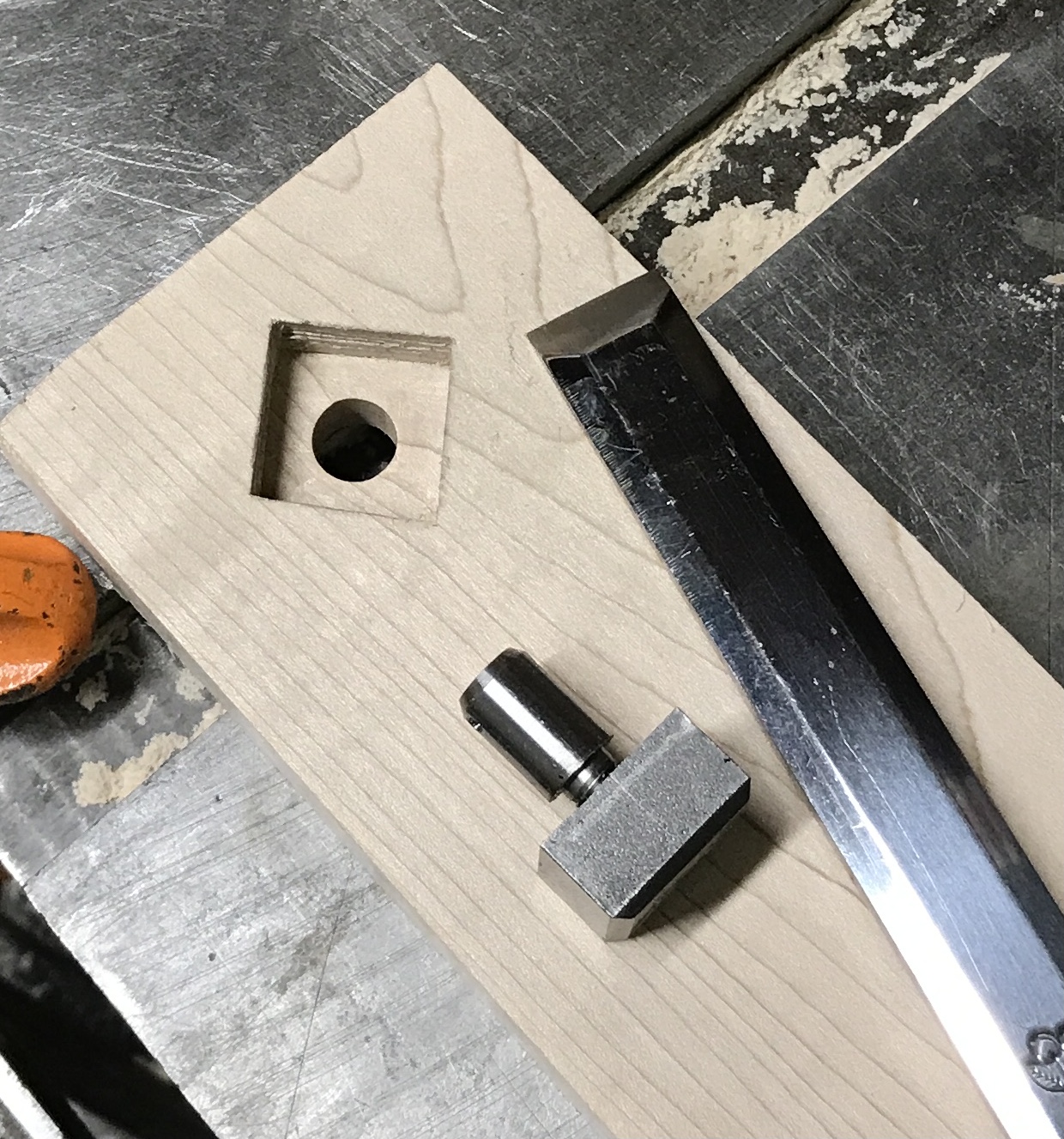 The square hole cut with a chisel